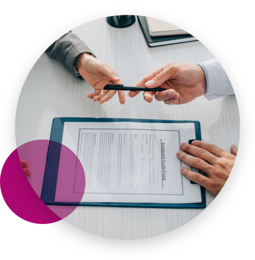 Man handing over a pen and a document for signature to a woman