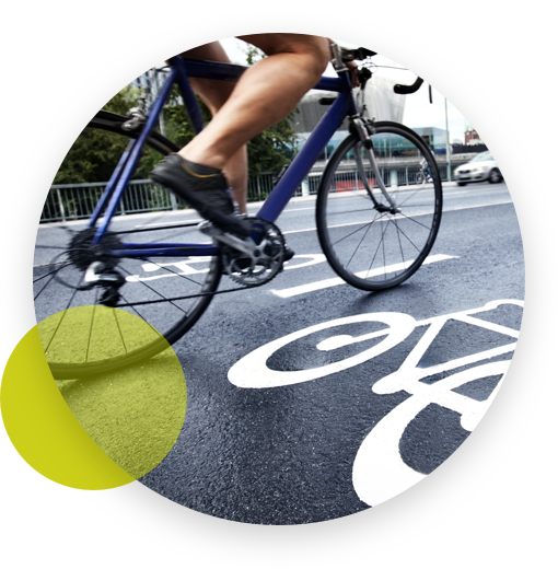 Cyclist speedily riding his bike on the road