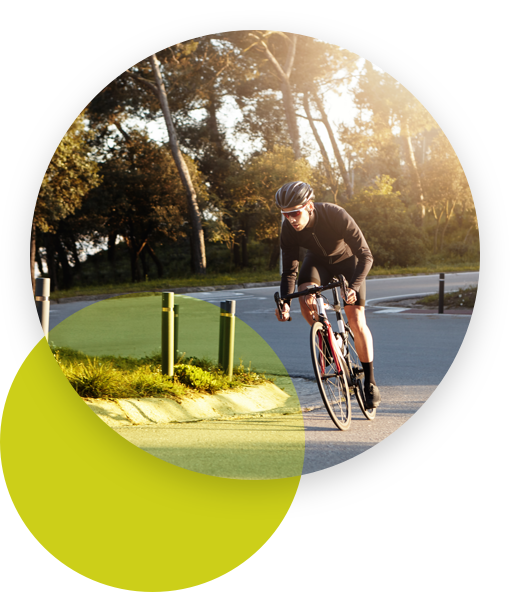 Cyclist riding his bike in an empty road