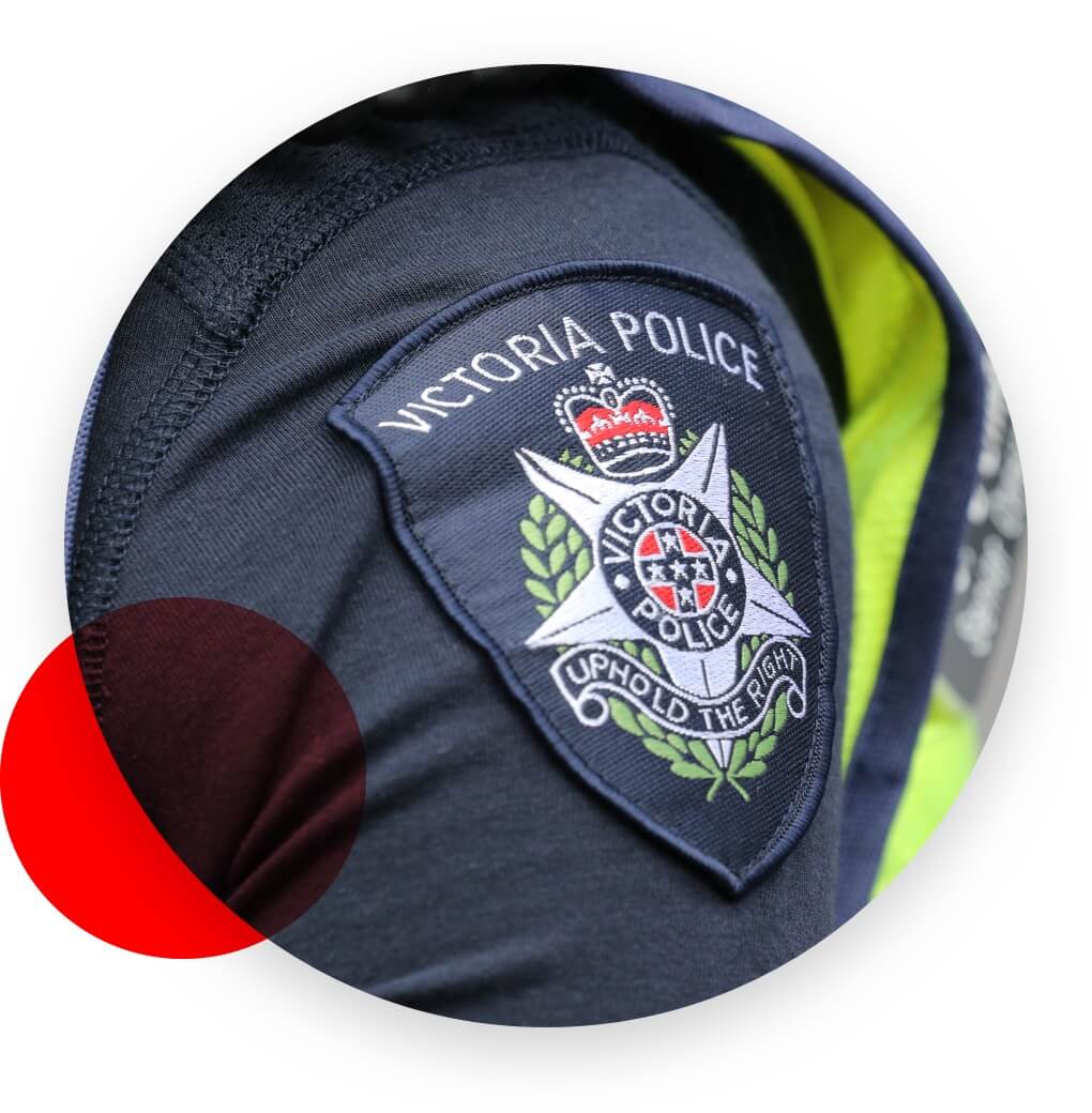 Close up of sleeve with Victoria Police badge