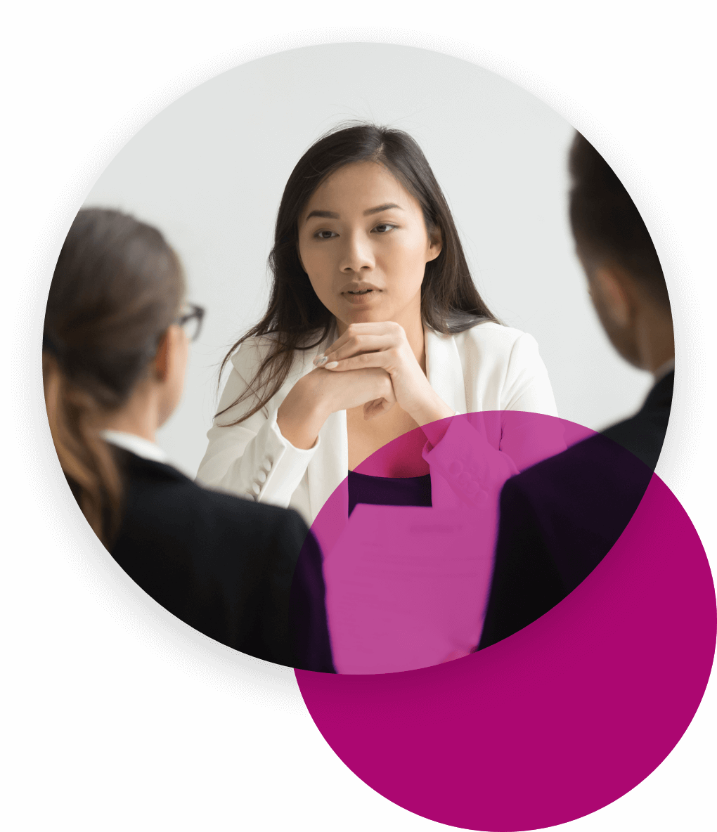 Woman listening intently to two people