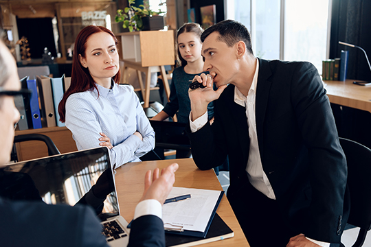 Disgruntled family in discussion with a lawyer